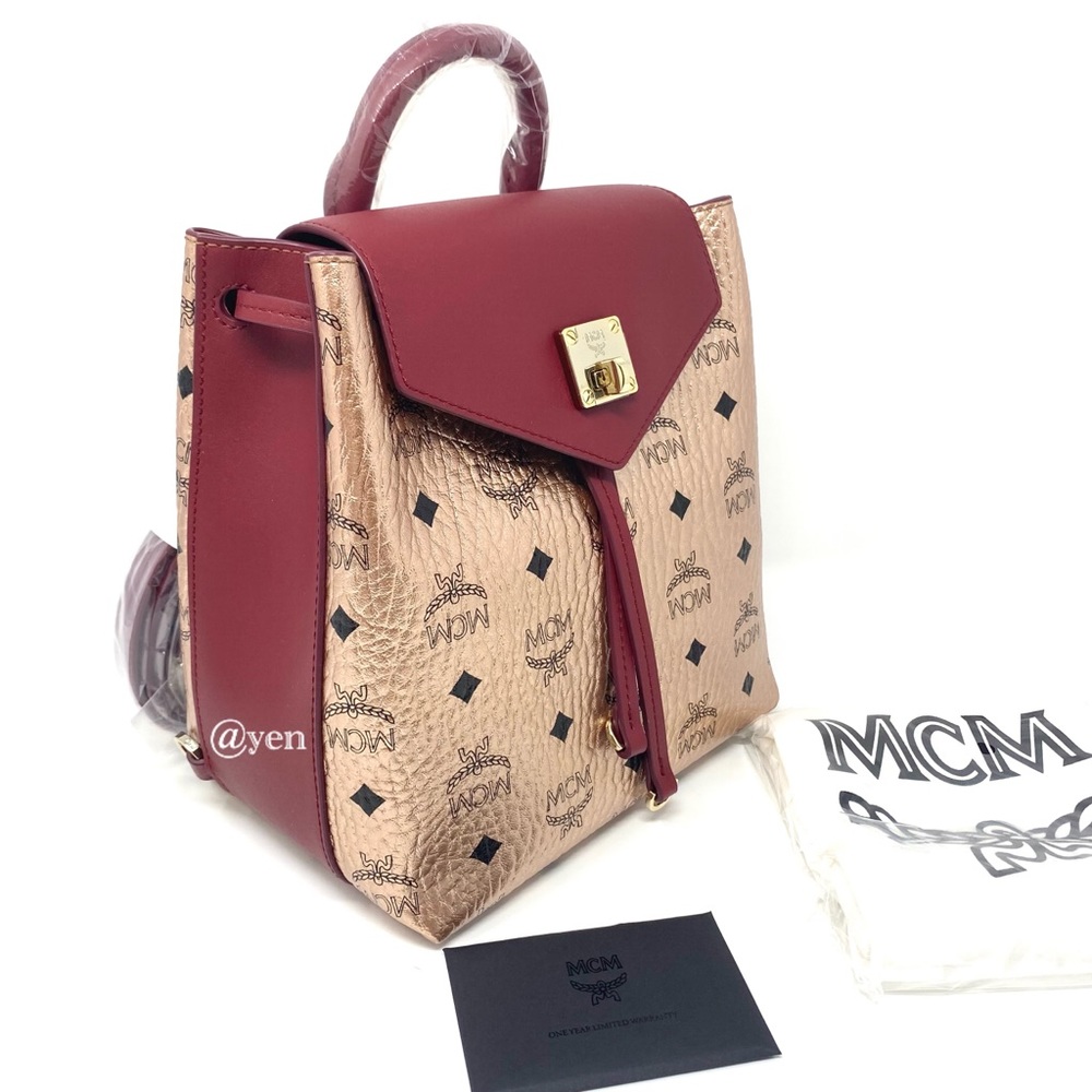 MCM Rose Gold Essential backpack / crossbody bag